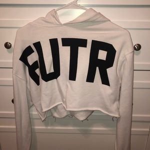 white “futr” lond sleeve crop top